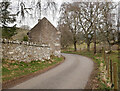 NH6532 : Road by Dunlichity Cemetery by Craig Wallace