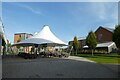 Tented area beside The Forum