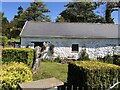 Whitewashed cottage at Burry Green