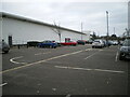 A carpark and the western side of Sainsbury