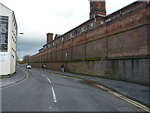 SJ9223 : Northern perimeter wall of Stafford Prison - Crooked Bridge Road by Richard Law