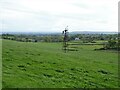 Grassland and wind pump near Caldcoats House