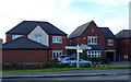 Fingerpost and new housing on Londesborough Road, Market Weighton