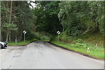 NH8305 : Road near Insh Church by N Chadwick