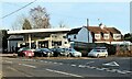 Cripps Corner Garage (left) and a house(s) called Sundial (right),