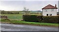 House and field gateway off SE side of B6413 at Greenacres Park