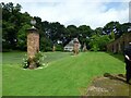 View across the tennis court to the Glass house