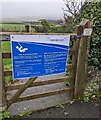 Blue notice on a wooden gate, Llanvair Discoed