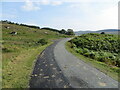 NC6036 : Road (B873) beside Loch Naver by Peter Wood