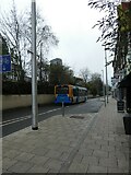 TQ0058 : Bus in the High Street by Basher Eyre