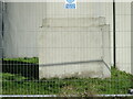 Cut mark on  foot of Stradbroke Road water tower