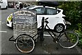 SM7525 : St Davids: Pebbles Yard Gallery & Espresso Bar, advert on a bike by Michael Garlick