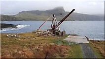 NG1247 : The disused crane above the Jetty on Neist Point by Clive Nicholson