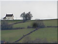 House on a hill viewed from Llandyssil