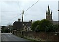 The Methodist spire glimpsed from Tilmore Road