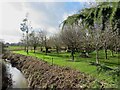 The gardens of the Grosvenor Hotel and the Pulford Brook