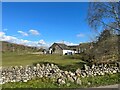 Broken wall near Bridge End Farm