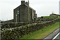 SH4649 : House next to the A487 near Bryn-ychain by David Dixon