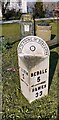 Milepost on NE side on A684 on the Green at Ainderby Steeple