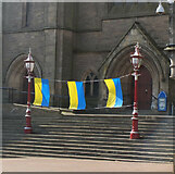 NT2540 : Ukraine flags, Peebles Parish Church by Jim Barton