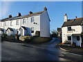 Road junction and some houses, Abbotsham, Devon