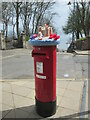 Letterbox  with  a  knitted  top