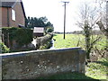 Skeyton Beck running beside dwelling