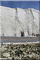 TV5595 : A small cave viewed over  wave-cut platform and cusps, Birling Gap by Adrian Diack