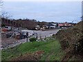 Commercial buildings next to the A55 and the railway