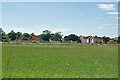 Housing advancing over green fields, Horley 2010