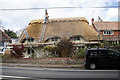 The Old Cottage being re-thatched