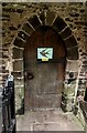 SO2827 : Swallow depiction on the church entrance door, Llanthony by Jaggery