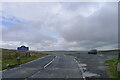 NY7943 : The A689 crossing the Cumbria/Durham county boundary at the top of Slate Hill by Tim Heaton