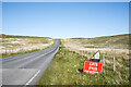 NY7943 : Cruel suggestion along Cumbrian road! by Trevor Littlewood