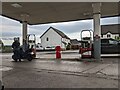 Petrol station and houses on Rhosmaen Street, looking east