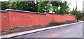 Wall on SW side of Porchester Road near the NW end of the road