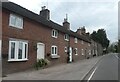 Terrace of houses by A52 in Kirk Langley