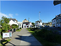 SM9537 : West Street in Fishguard, looking east in evening sun by Rob Purvis
