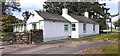 Toll Bar Cottage on west side Kemplay Bank (A6)