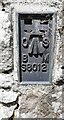 NY5327 : Benchmark on St Cuthbert's Church by Roger Templeman