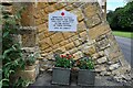 Todenham Village Hall: Dedication on the east wall buttress