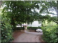 Approaching a bend in Mill Lane