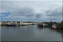 NU2232 : Boats in Seahouses Harbour by DS Pugh