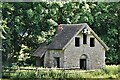 Spelsbury: Seemingly deserted building seen from All Saints churchyard