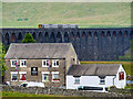 SD7679 : Ribblehead Viaduct and the Bunkhouse at the Station Inn by David Dixon
