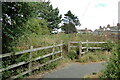 Here the railway continues onto waste ground