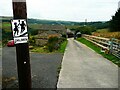 SE0517 : Re-used old road sign and stile on Footpath 109/1, Barkisland by Humphrey Bolton