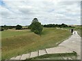 SU1069 : Avebury henge - ditch and bank by Stephen Craven