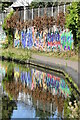 Graffiti reflected in Worcester and Birmingham Canal