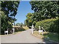 Looking from the road into the drive to Coldhayes